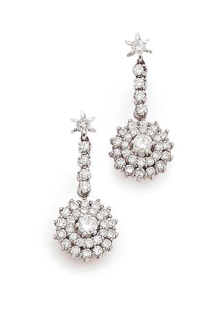 A pair of white gold (750) earrings with...