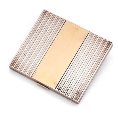 MELLERIO, Paris
Rectangular silver poudrier...