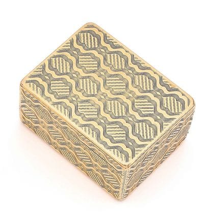 Yellow gold (750) box of rectangular shape...