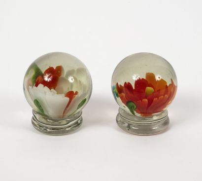 Two paperweights on pastille, being able...