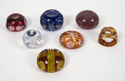 Seven paperweights of spherical forms, some...