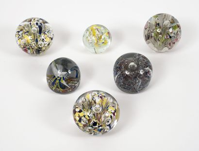 Six paperweights, some with flat bottom,...