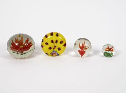 Four paperweights of spherical form, one...
