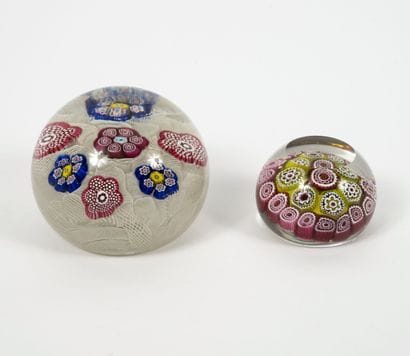 MURANO
Two paperweights in colorless glass...