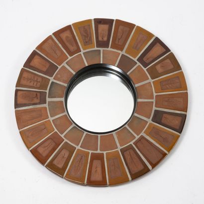 ROGER CAPRON (1922-2006)
Circular mirror.

Frame...