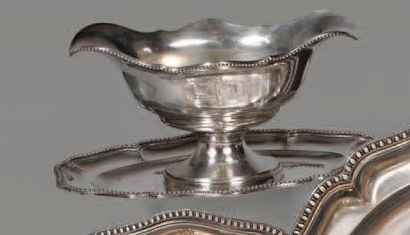 Saucière et son présentoir de forme ovale...