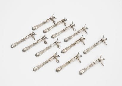Twelve silver plated chopsticks and silver...