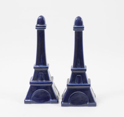 Pair of Eiffel Tower bottles, in blue glazed...