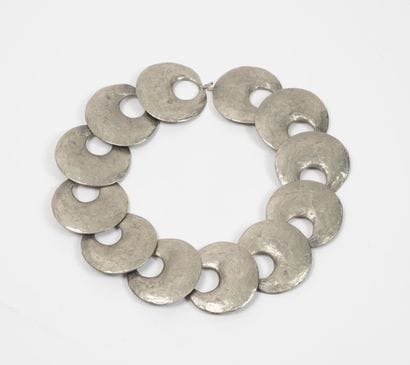 Breastplate necklace in hammered metal formed...