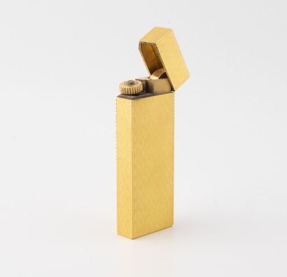 CARTIER Paris
Briquet de poche en métal doré...
