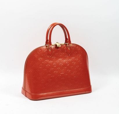 Louis VUITTON, Alma
Sac en cuir vernis orange...