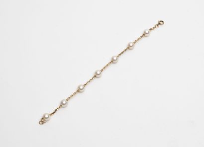 Bracelet souple formé d'une chaîne à maille...