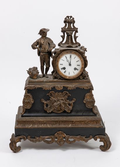 Black marble and gilt bronze clock, decorated...