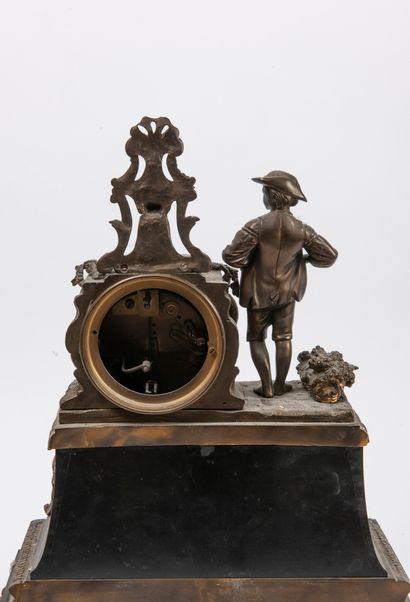 Black marble and gilt bronze clock, decorated...
