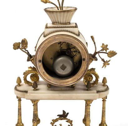 White marble and gilded bronze mantel set...