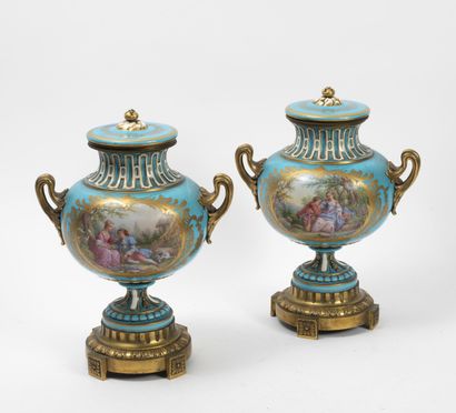 Dans le goût de SEVRES 
Pair of covered vases...