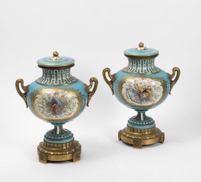 Dans le goût de SEVRES 
Pair of covered vases...
