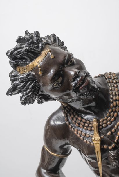 Nubian holding a hat, forming a torch-holder,...