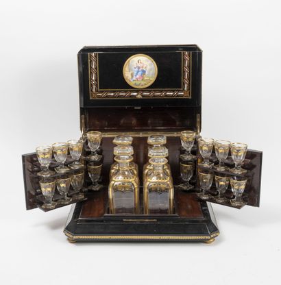 Liqueur cabinet in blackened wood, decorated...
