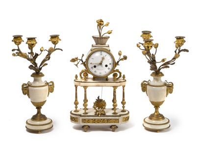 White marble and gilded bronze mantel set...
