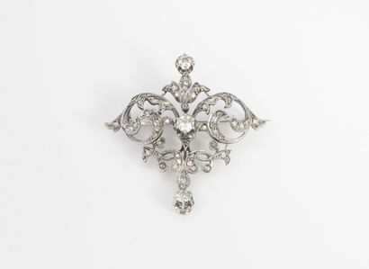 A white gold (750) brooch decorated with...