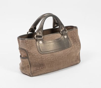 CELINE
Sac à main en daim gris taupe estampé...
