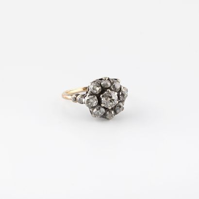 Yellow gold (750) and silver (950) daisy...