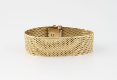 Yellow gold (750) ribbon bracelet with braided...