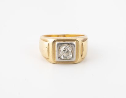 Yellow and white gold (750) signet ring centered...