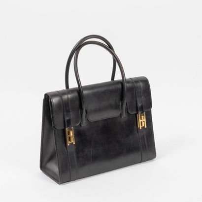 HERMES Paris
Sac Drag en veau box originellement...