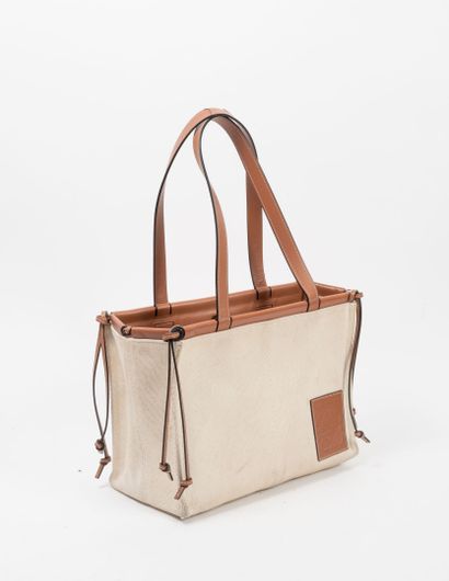 LOEWE
Sac cabas en toile écrue et cuir naturel,...