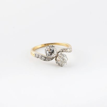 Yellow gold (750) and platinum (850) ring...