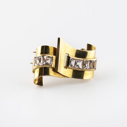 Yellow gold (750) ribbon clip with double...