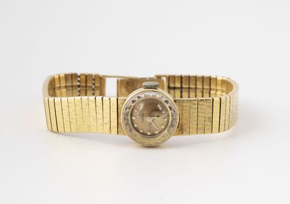 OMEGA
Yellow gold (750) lady's wristwatch....