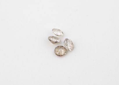 Four small diamonds on paper of old size.
Approximate...