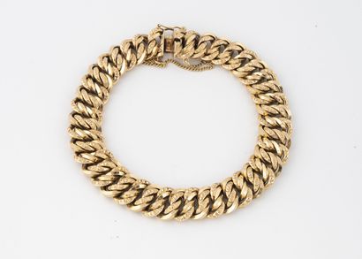 Bracelet gourmette en or jaune (750) à maille...