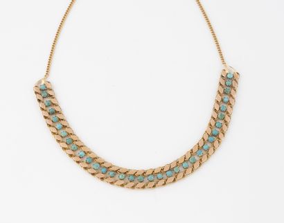 Collier en or jaune (750) orné d'une ligne...