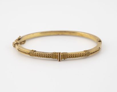 Rigid opening bracelet in yellow gold (585)...