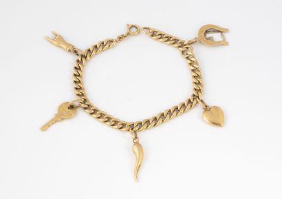 Bracelet en or jaune (750) à maille gourmette...