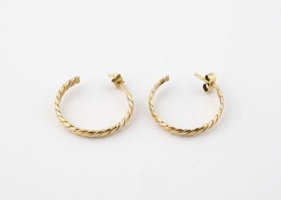Pair of three-tone gold (750) half-shells...