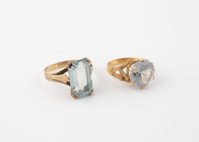 Two yellow gold (750) rings set with one...