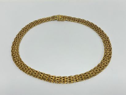 Collier en or jaune (750) à maille tressée...