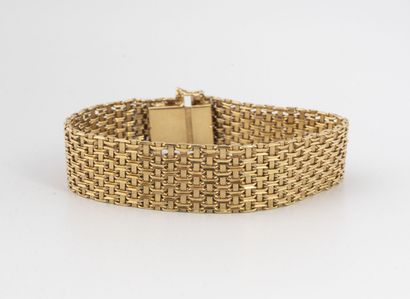 Bracelet in yellow gold (750) with braided...