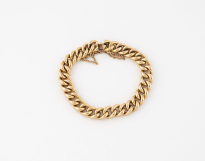 Bracelet en or jaune (750) à maille gourmette...