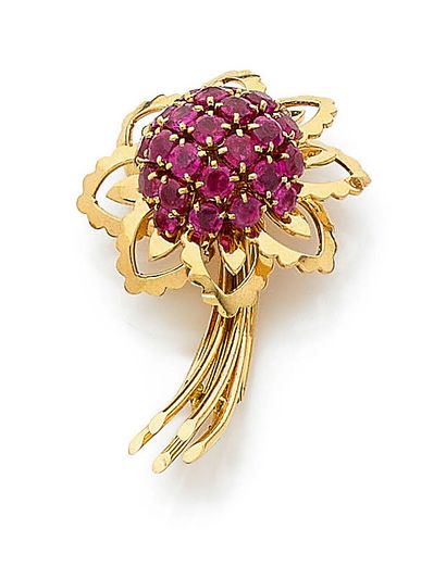 Yellow gold (750) flower lapel clip, the...