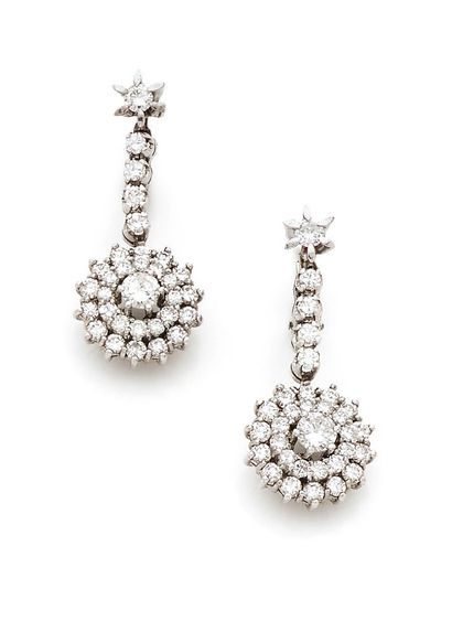 A pair of white gold (750) earrings with...