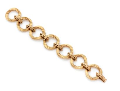 Yellow gold bracelet (750) formed of seven...