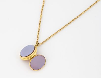 Yellow gold metal necklace with a curb chain...