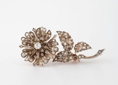 Pink gold (750) and silver (800) brooch decorated...