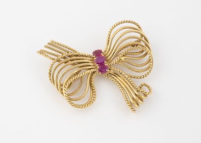 Broche noeud en filins d'or jaune (750) unis...